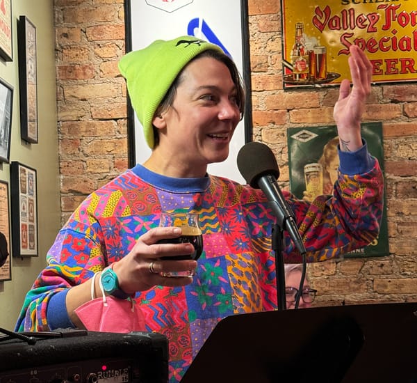 Tuesday Funk Cohost Erin Watson delivering a toast